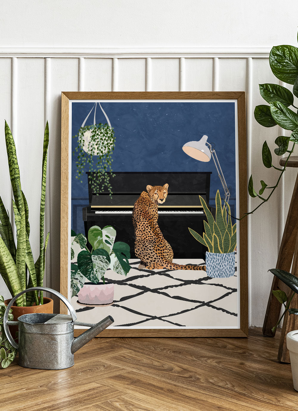 Cheetah Tunes Art Print by Sarah Manovski in a funky interior space with house plants and a watering can