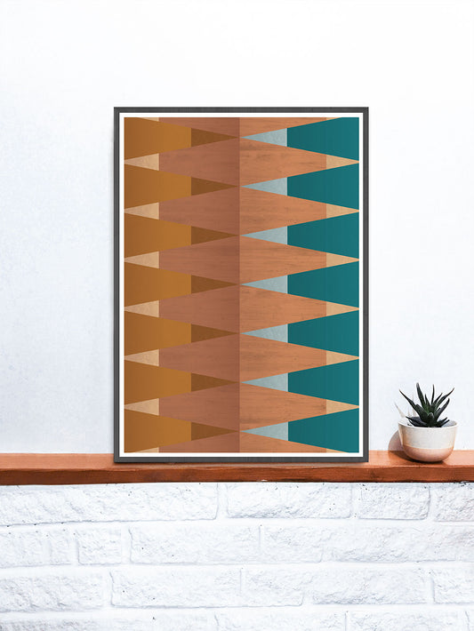 Copper Tops geometric wall art on a shelf