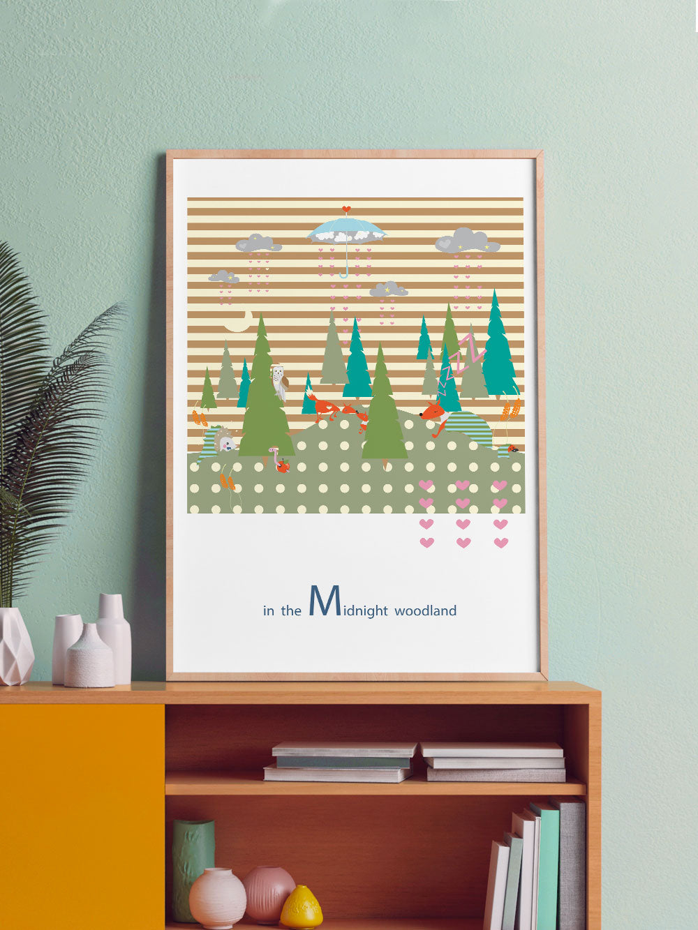 Midnight Woodland Forest Print in a frame on a shelf