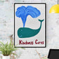 Kindness Cares Quirky Art Print in a frame on a wall