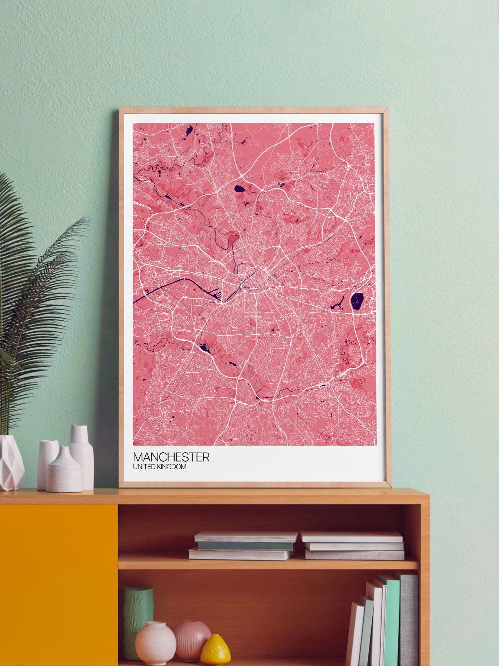 Manchester City Map Print in a frame on a shelf
