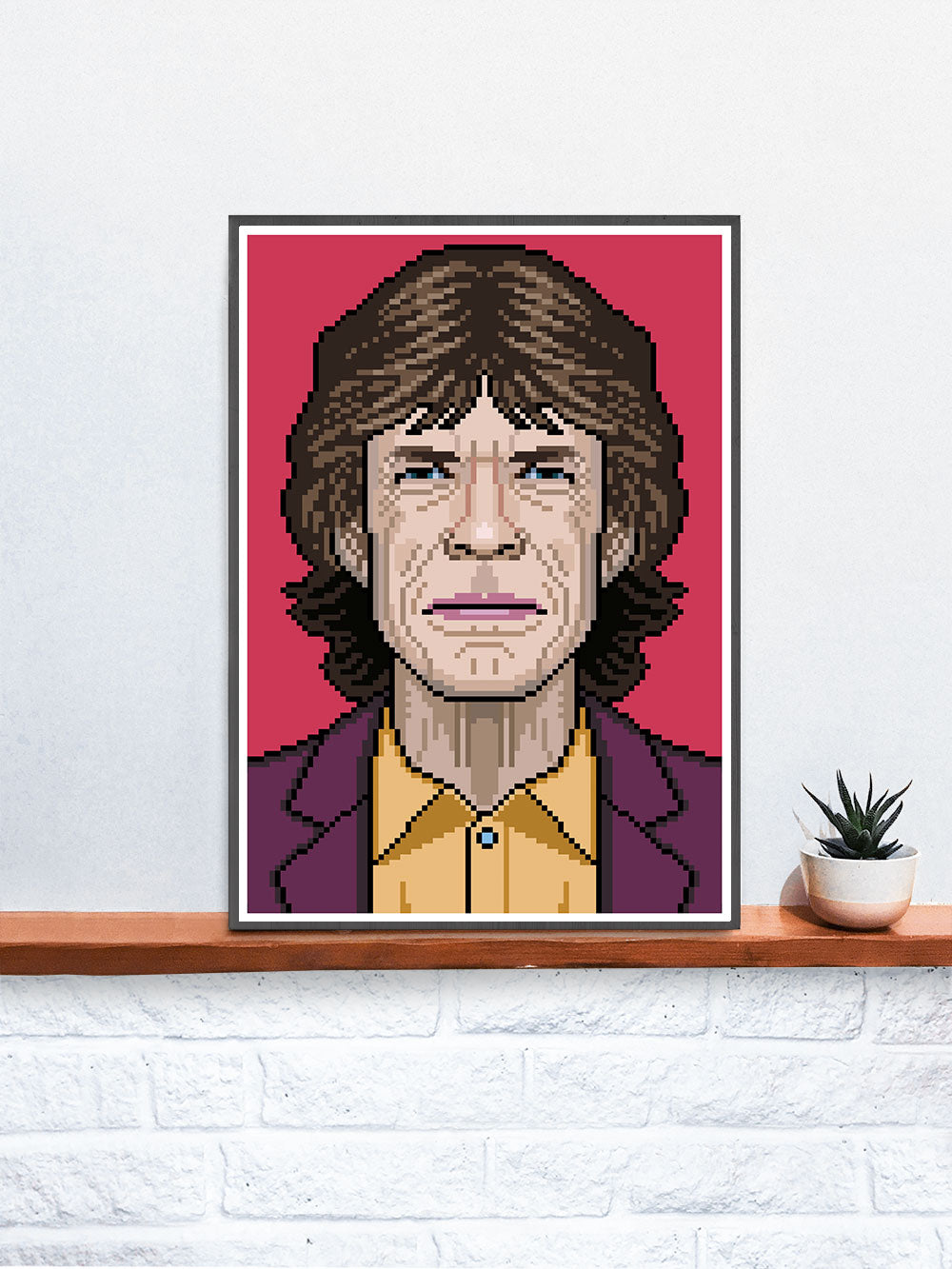 Mick Rock Icon Art Print in a frame on a shelf