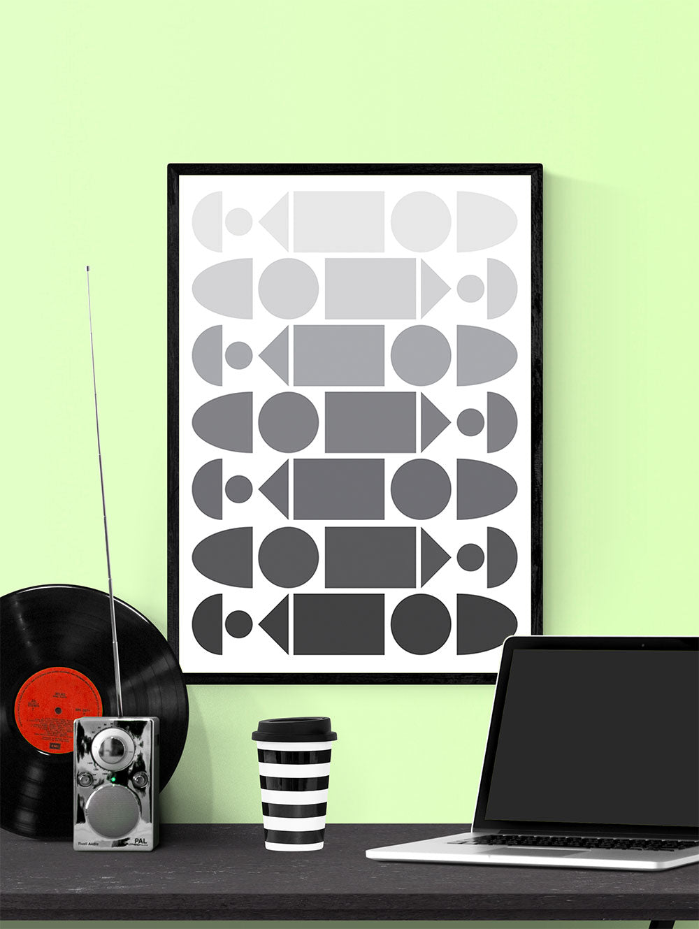 Monochrome Progression Black and White Pattern Design in a frame on a wall