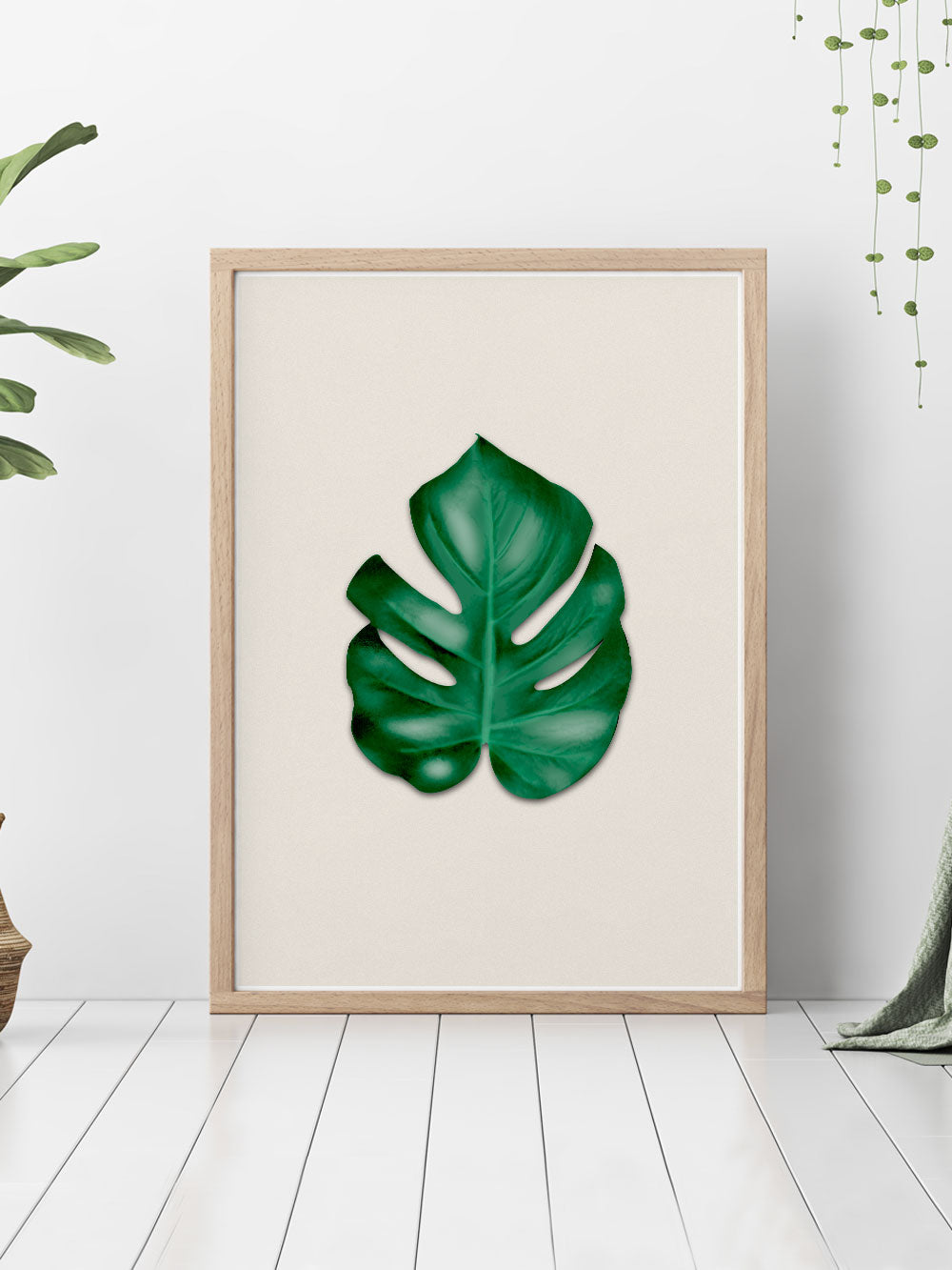 Stunning Monstera Leaf Art Print showcased on a bedroom floor