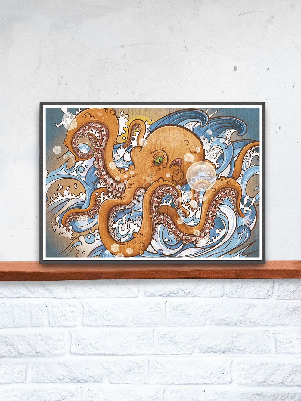 Octopus Sea Creature Print in a frame on a shelf