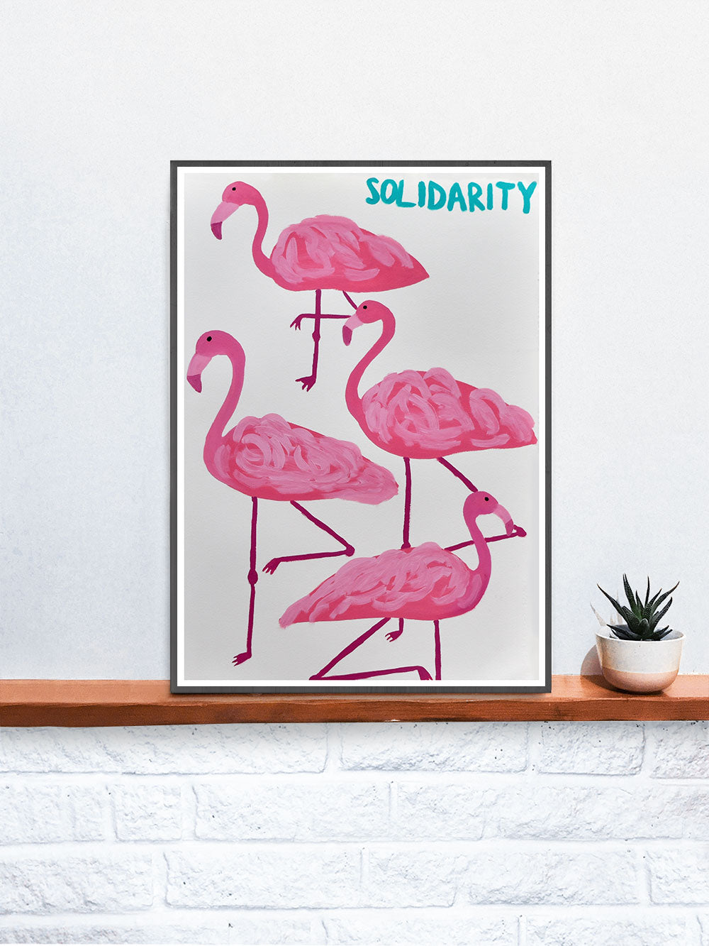 Solidarity Flamingo Wall Print on a Shelf